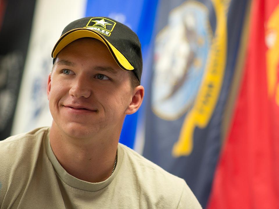 closeup of student in hat